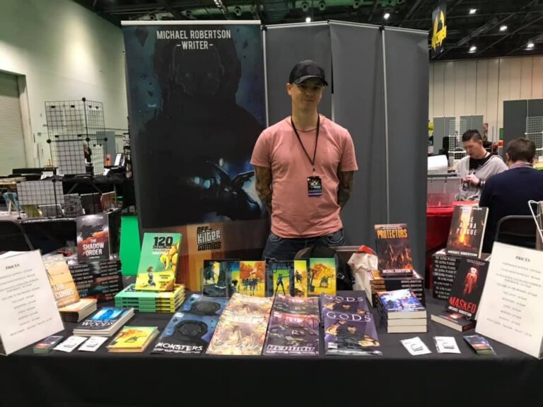 Author Michael Robertson at his Off-Kilter Comics convention table